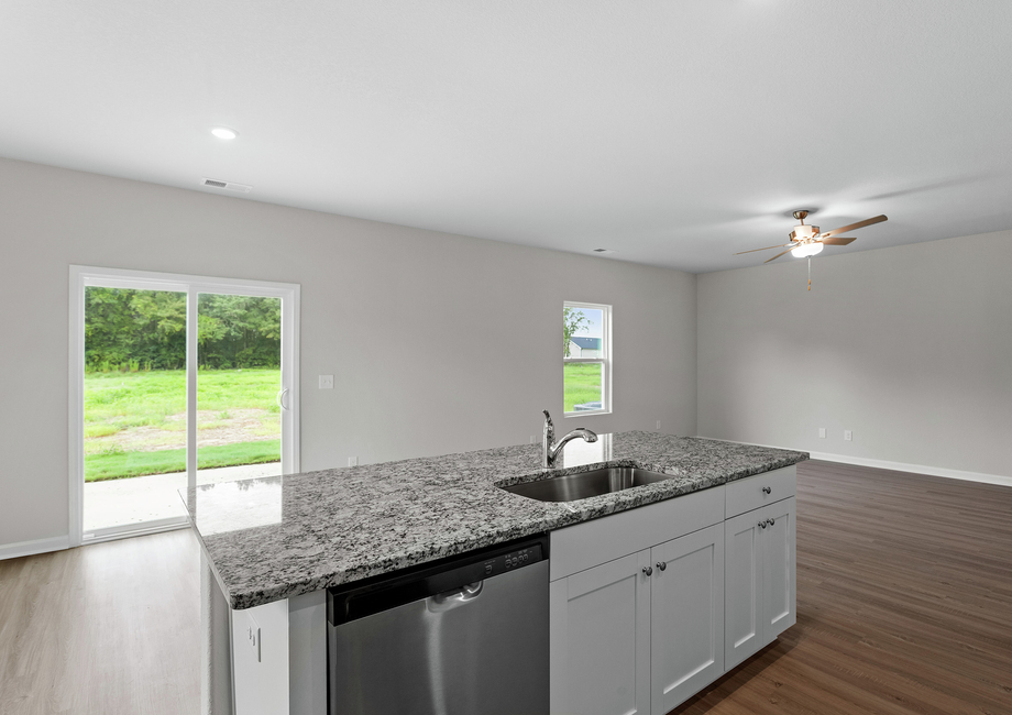 Kitchen overlooks the dining room.