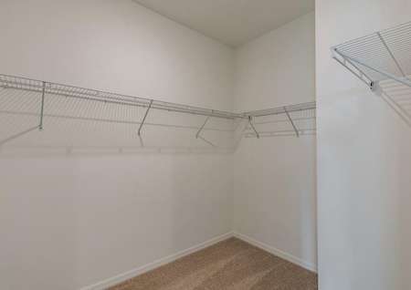 A large walk-in closet with plenty of storage space, located in the master retreat
