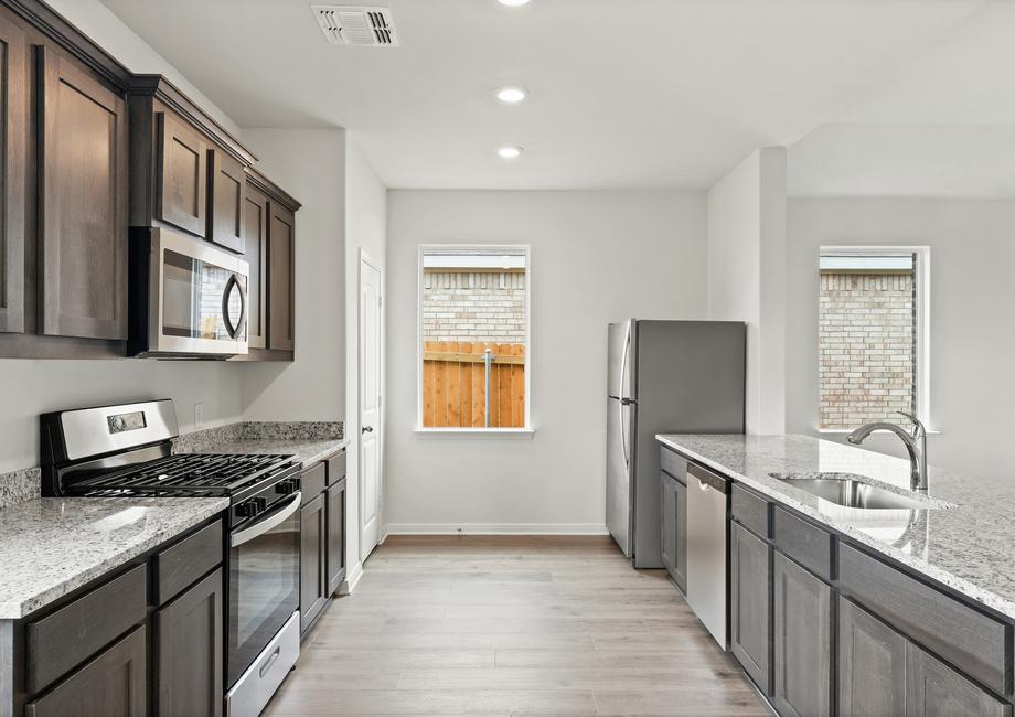 The kitchen has energy efficient appliances.