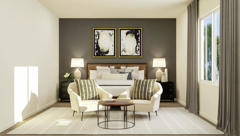 Rendering of the spacious owner's suite,
  complete with large furniture and seating area.