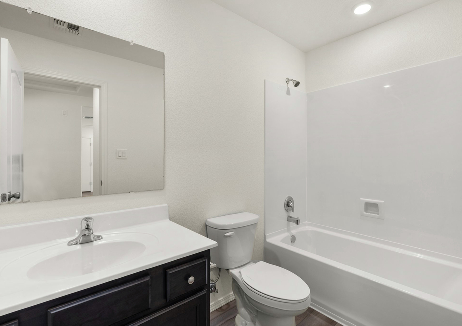 This bathroom has a large soaking tub.