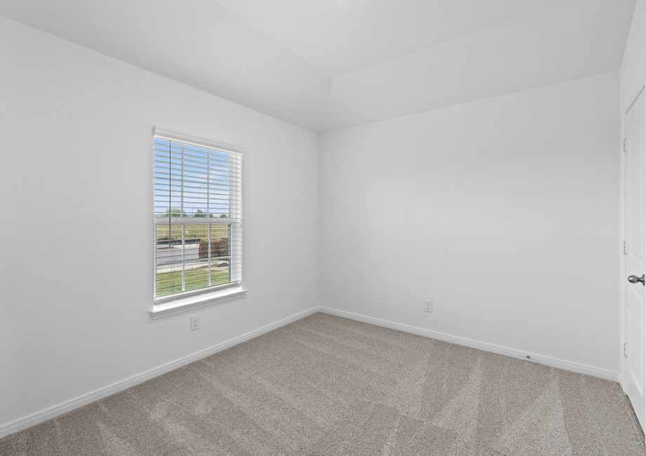 Both secondary bedrooms feature lush carpet