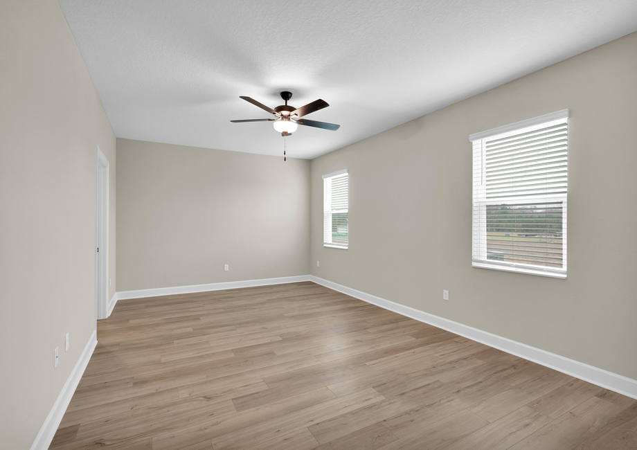 Unwind in the cozy master bedroom