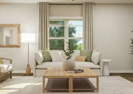 Rendering of the living room showing a
  cream couch and light wood coffee table placed in front of a large window.
  Two accent chairs, a floor lamp and a mirror are also visible.