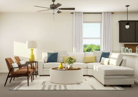 Rendering of the Maple's spacious open
  floor plan featuring the living area and large kitchen.