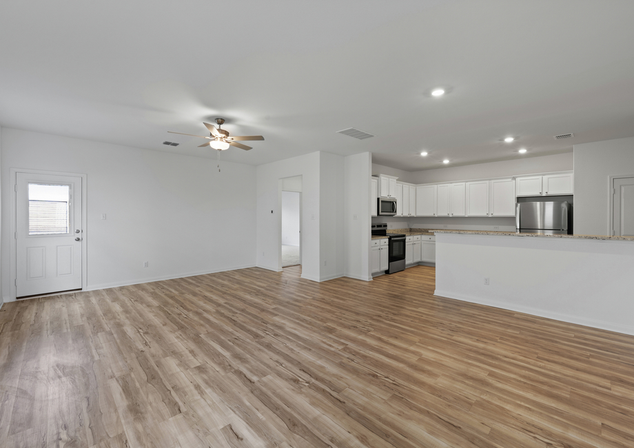 The chef-ready kitchen looks over the family room