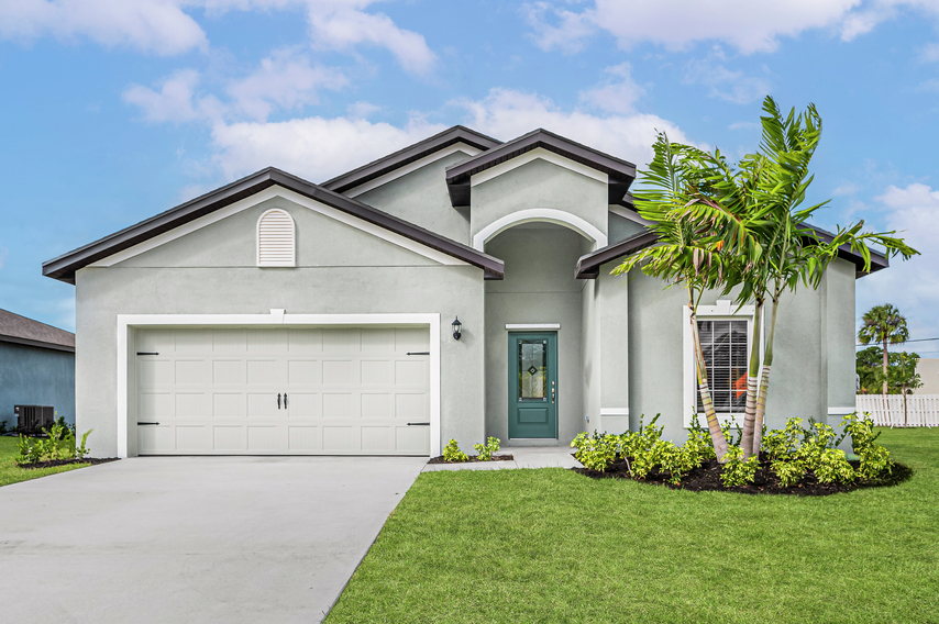 Exterior of the Escambia with front yard landscaping