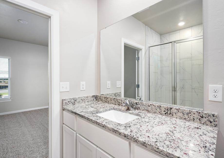 The master bathroom of the Sudan has a large vanity space.