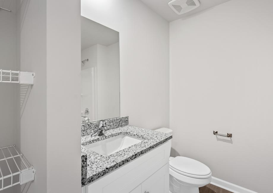 The secondary bathroom provides all the space your guests need to get ready for their day