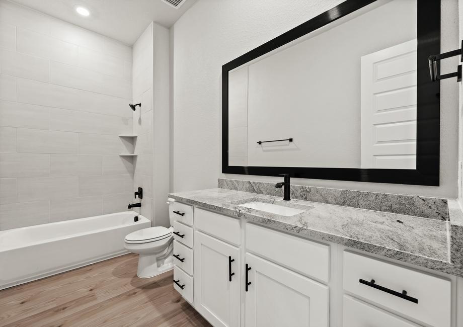 Large framed mirrors are included in all bathrooms.