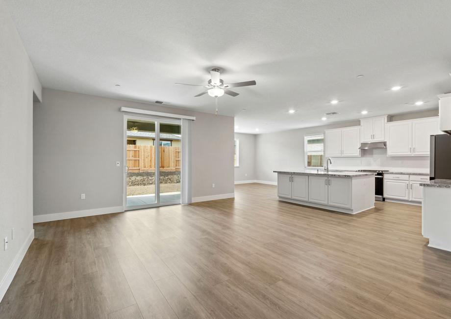 The kitchen overlooks the spacious living area.