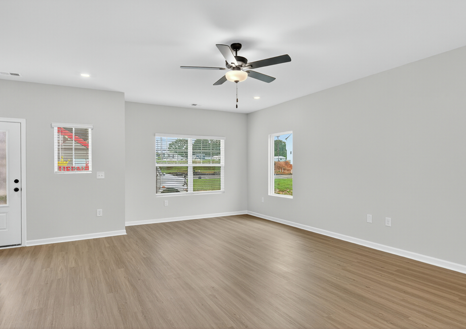 Windows let in natural light to the living area. 