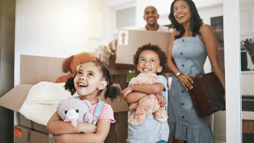 Family walking into their new home.