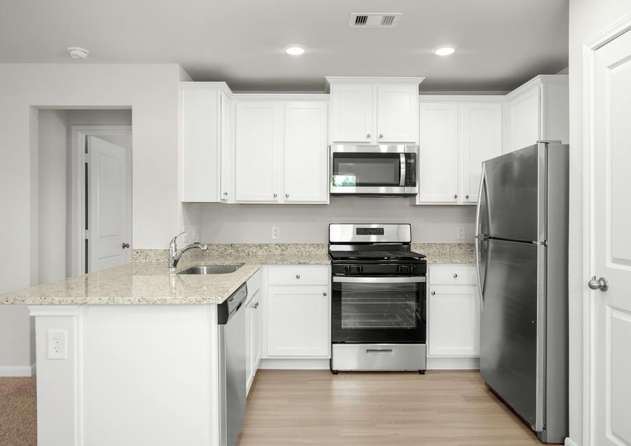 The chef-ready kitchen has stainless steel appliances!