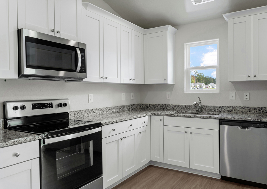 This kitchen has granite countertops.