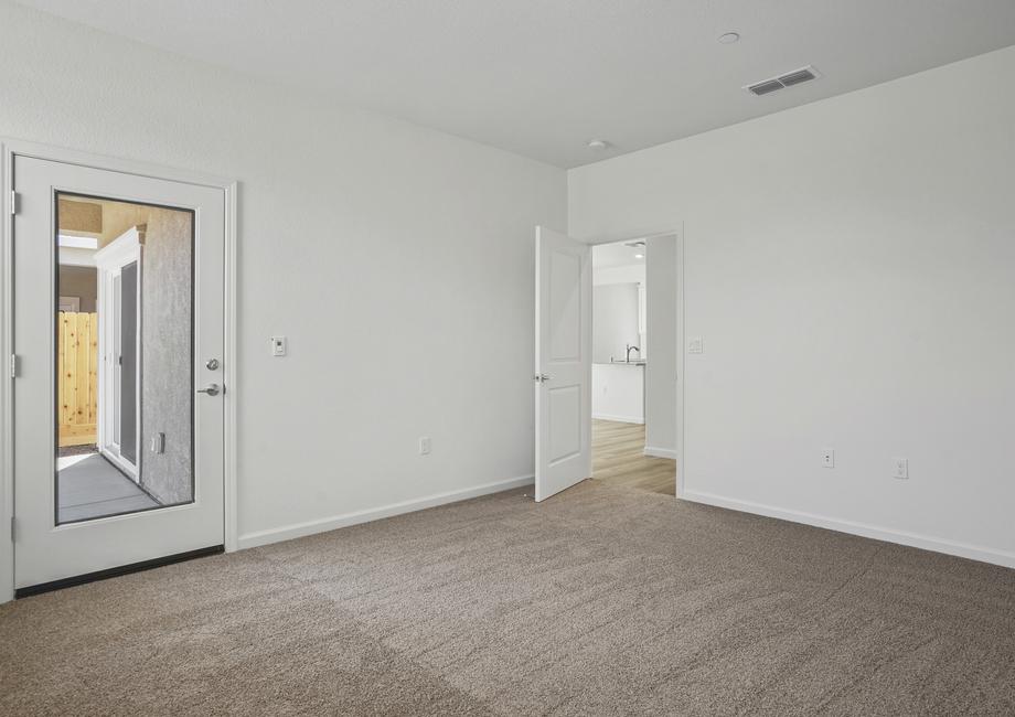 Master bedroom with patio door