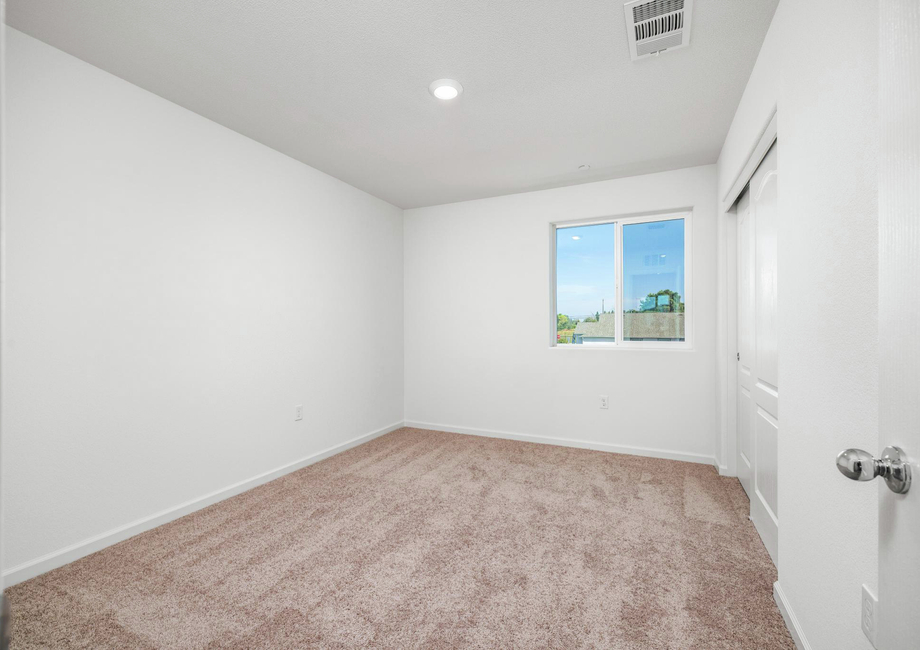 The secondary bedroom has carpet.