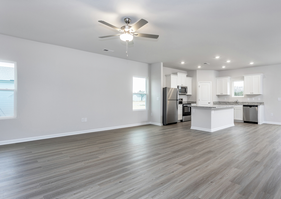 The living room opens to the kitchen