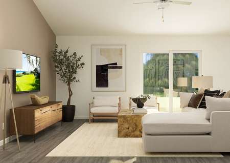 Rendering of the living room furnished
  with a grey sectional couch and two side chairs.