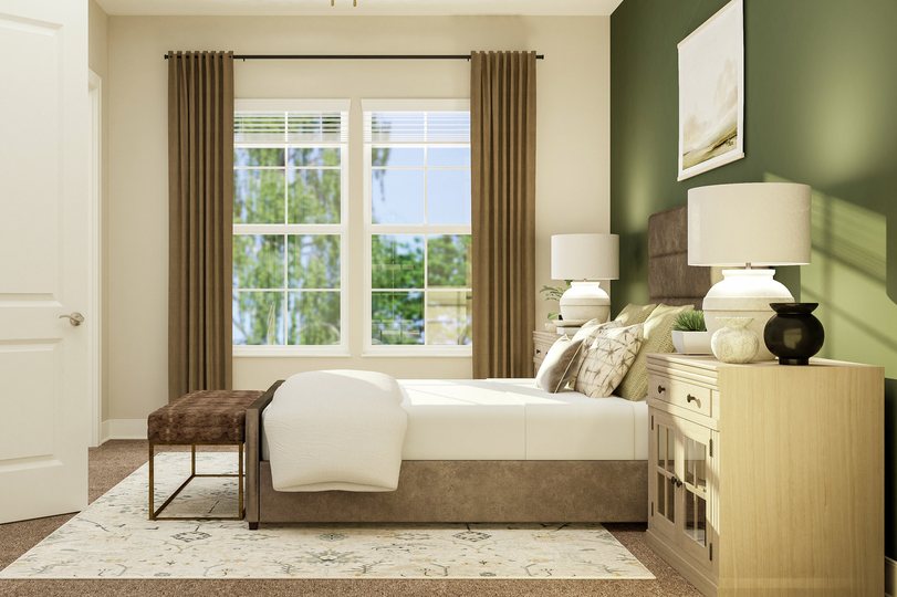 Rendering of third bedroom showing a tan
  framed bed with nightstand in front of large window with curtains and beige
  carpet flooring throughout.