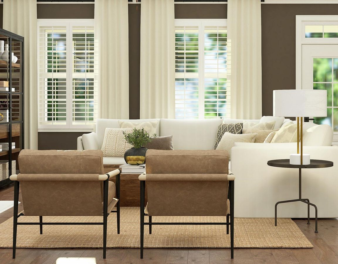 Rendering of living room with a large
  white sectional and two side chairs. This room also highlights two large
  windows behind the couch. 