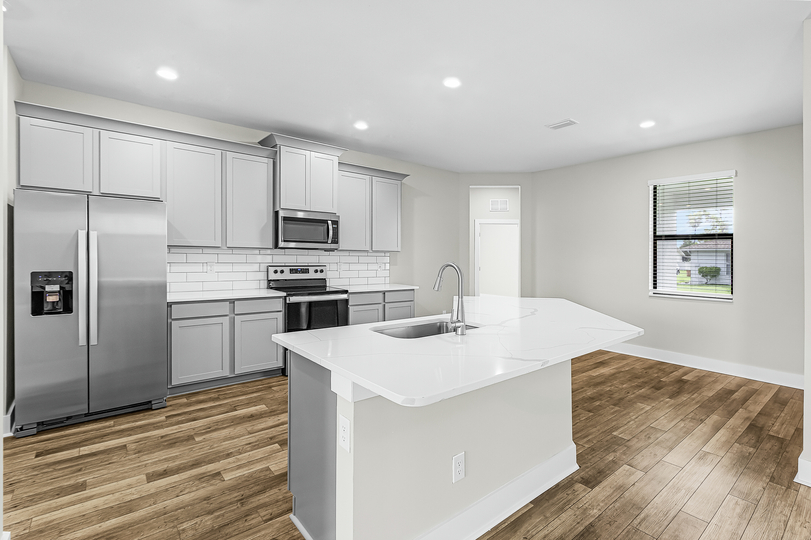 Fully loaded kitchen with appliances.