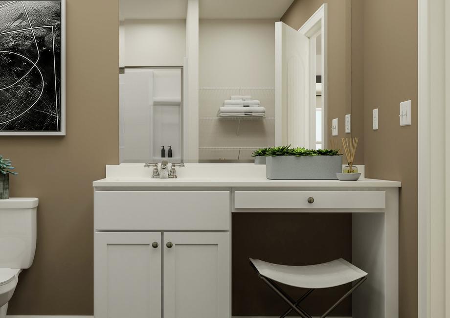 Rendering of the master bath focused on
  the white cabinet vanity. A toilet is beside it and the shower is visible in
  the mirror.