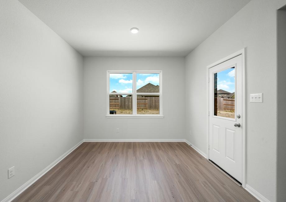 The dining room has with back yard access