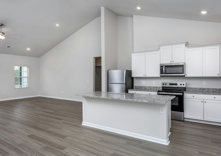 The kitchen comes with stainless steel appliances