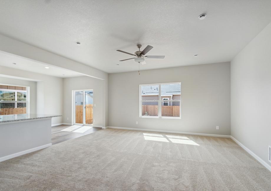 The family room is spacious and open to the dining room and kitchen.