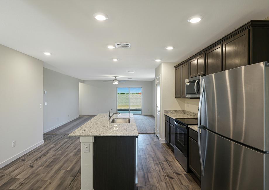 The spacious kitchen is perfect for preparing your family's favorite meals and treats.