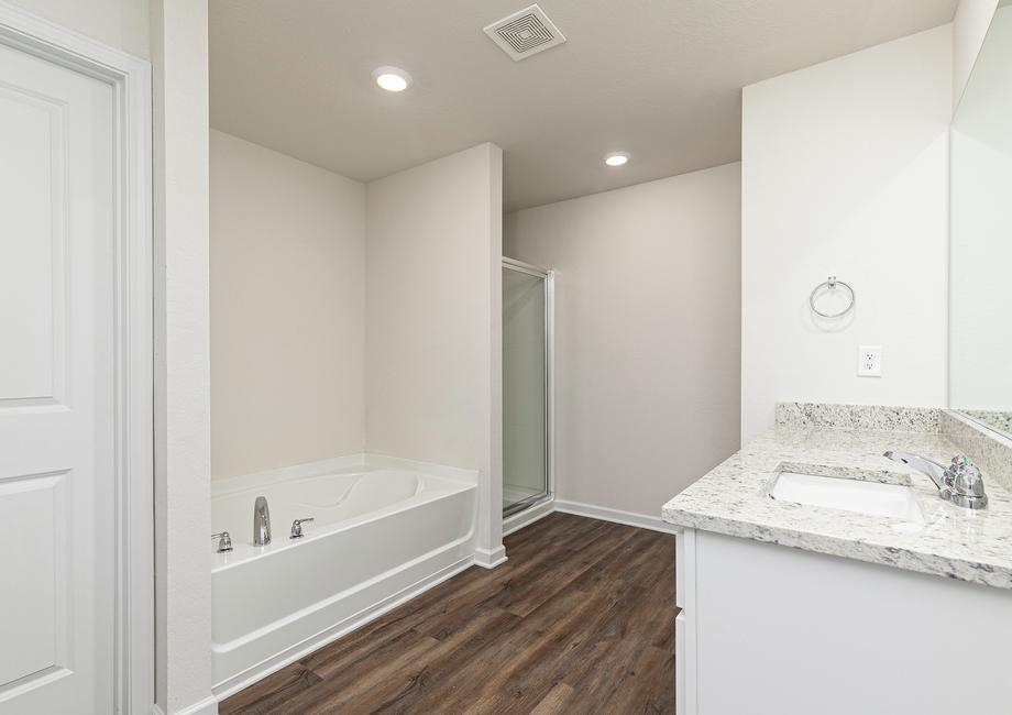 The Jackson's master bathroom has a separate walk-in shower and bathtub