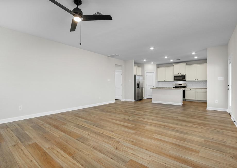 The dining room is open to the kitchen and family room.