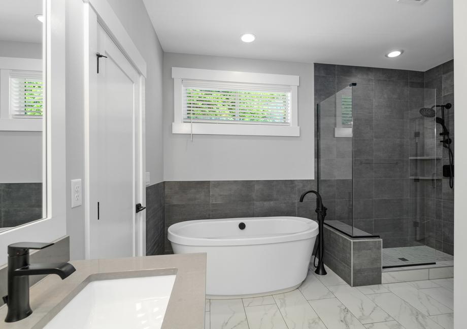 In the master bathroom you have a standalone tub and an impressive walk-in shower.