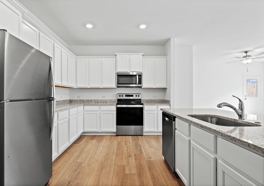 Enjoy a chef ready kitchen filled with stainless steel appliances