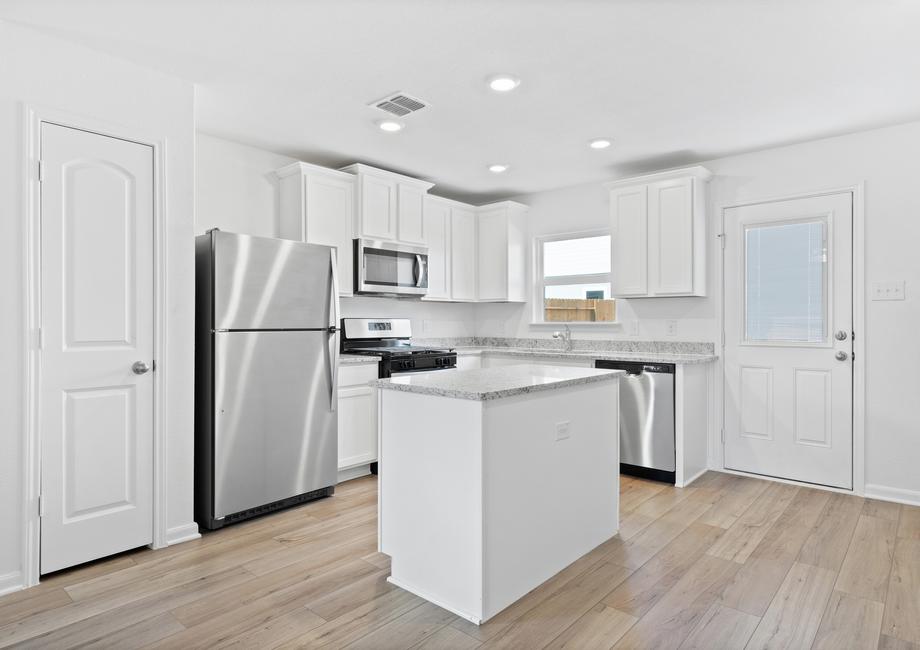 The kitchen comes with white cabinets and grey granite countertops.