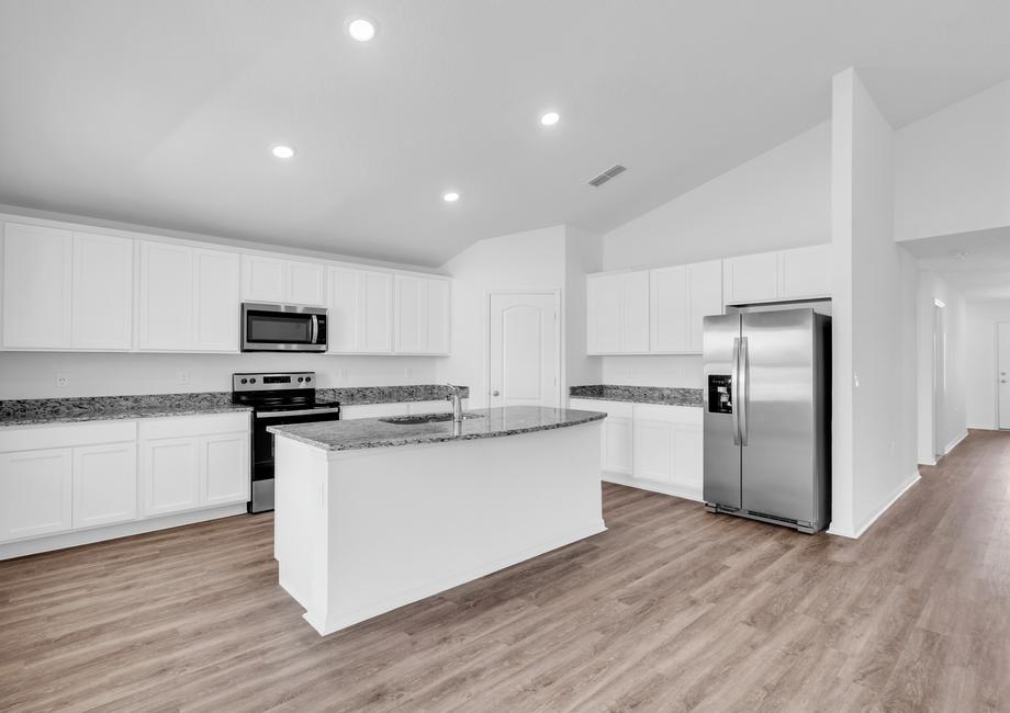 This chef-ready kitchen is perfect for chefs of all skill levels with a gorgeous island and stainless steel appliances