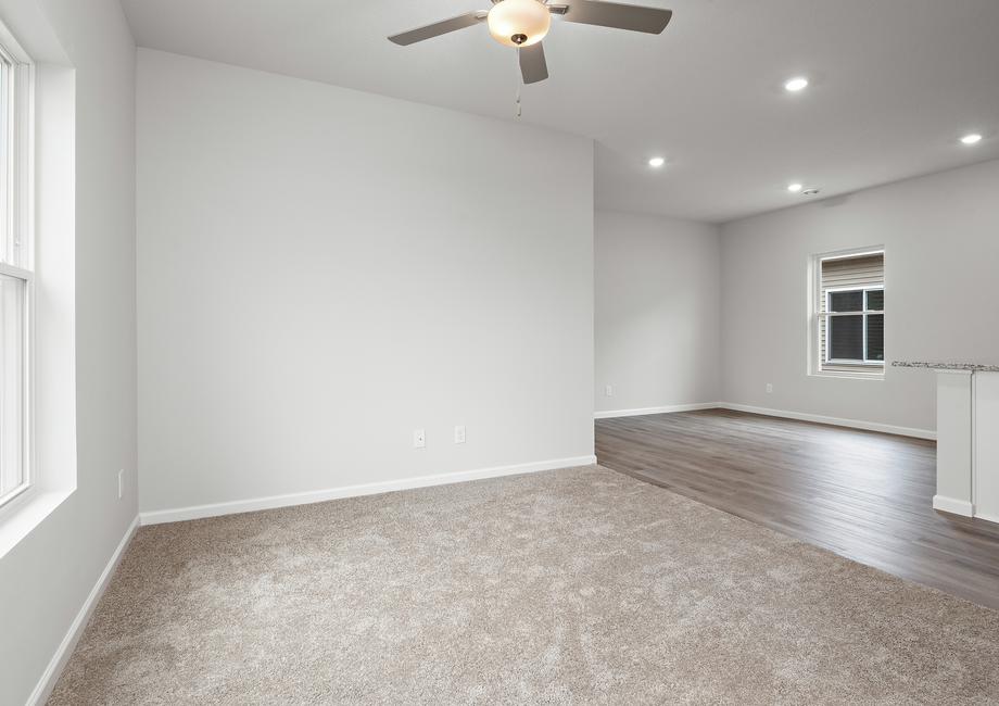 The family room and dining room are adjacent to each other and off the kitchen.