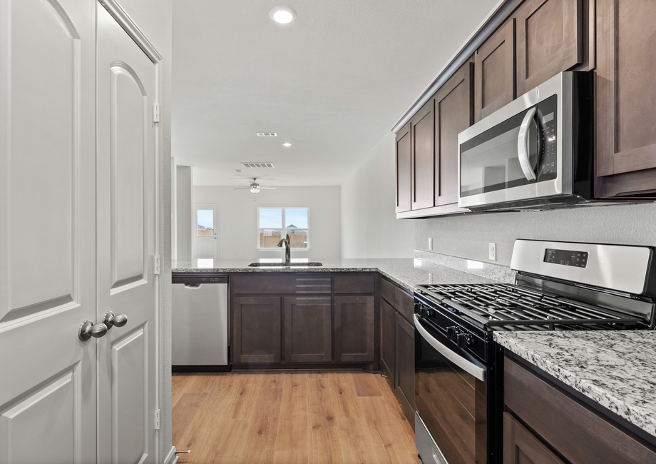 The kitchen has stainless-steel appliances.