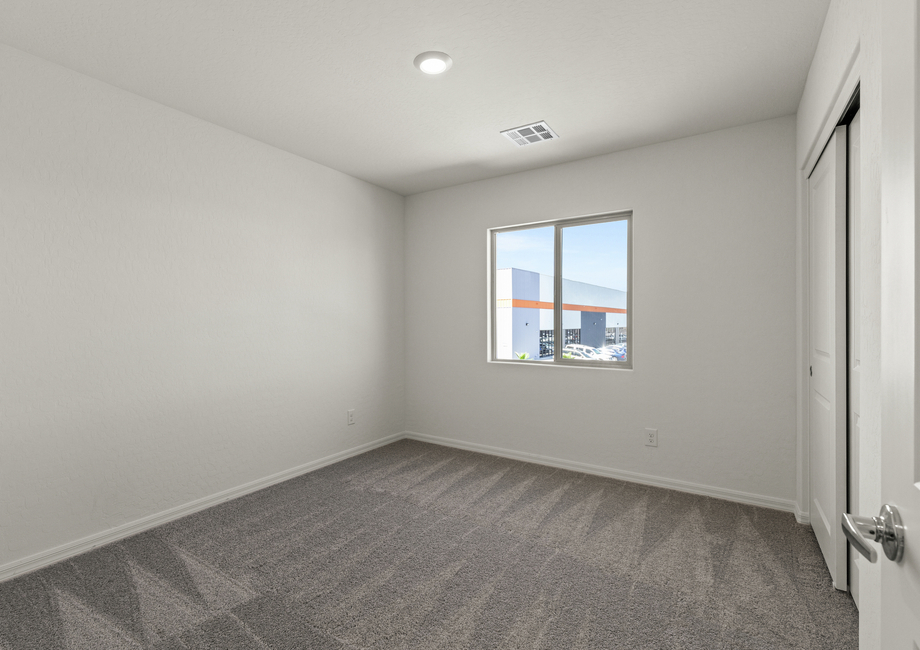 The secondary bedrooms of the Cypress plan are a great space as children's bedrooms or as guest rooms.