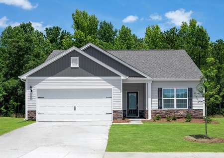 The Alamance at Knights Bridge has a two-car garage and stone detailing.