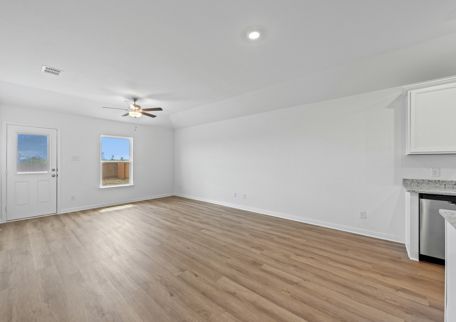 A spacious open concept with luxury vinyl flooring