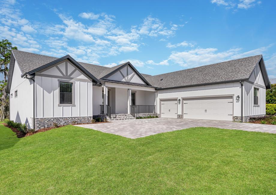 The Sawgrass has an inviting exterior with a three-car garage.