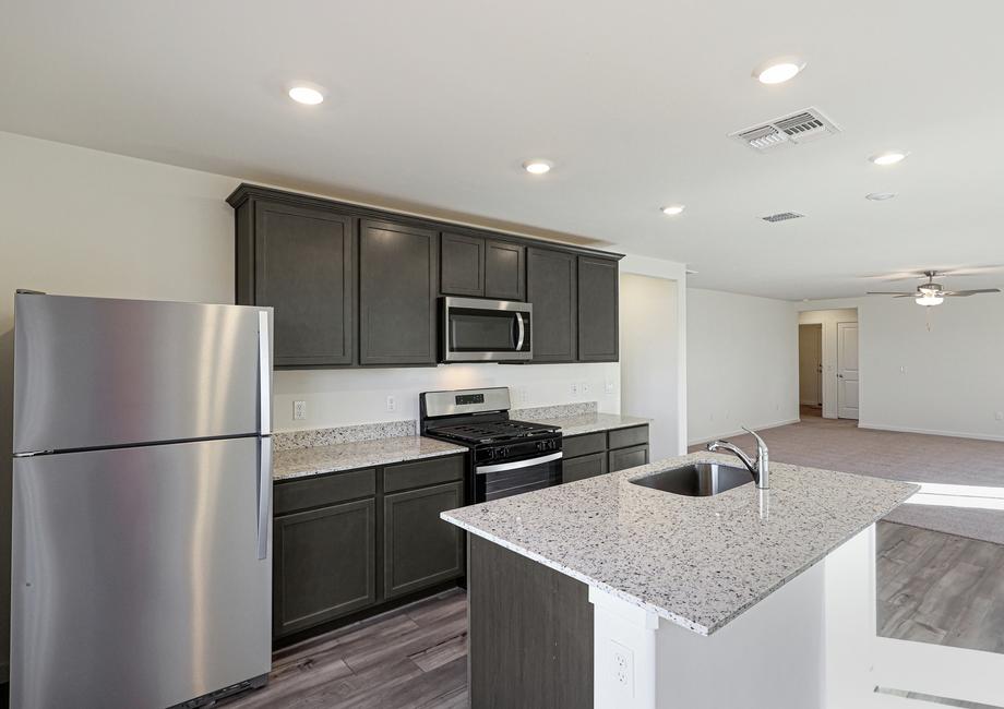 The kitchen comes with a full suite of stainless steel appliances!