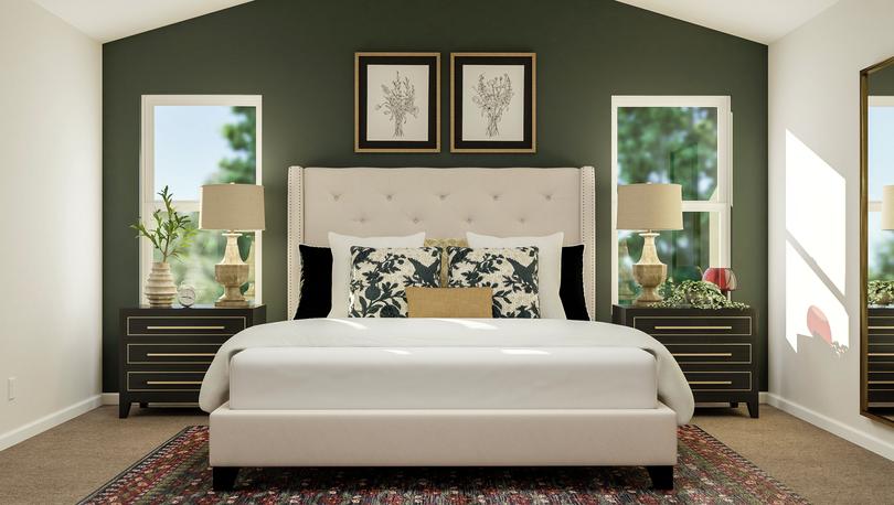 Rendering of the spacious master bedroom
  in the Hartford. The room has a vaulted ceiling, two windows and carpeted
  flooring and is furnished with a large bed and two nightstands.