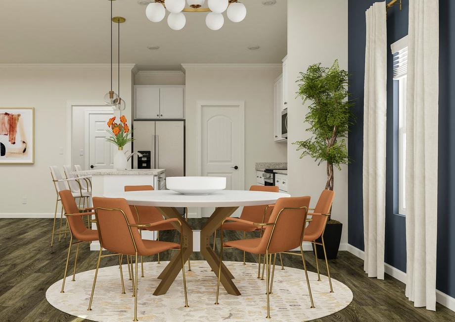 Rendering of the dining room with the  kitchen in the background. The dining room is furnished with a round  six-person table.