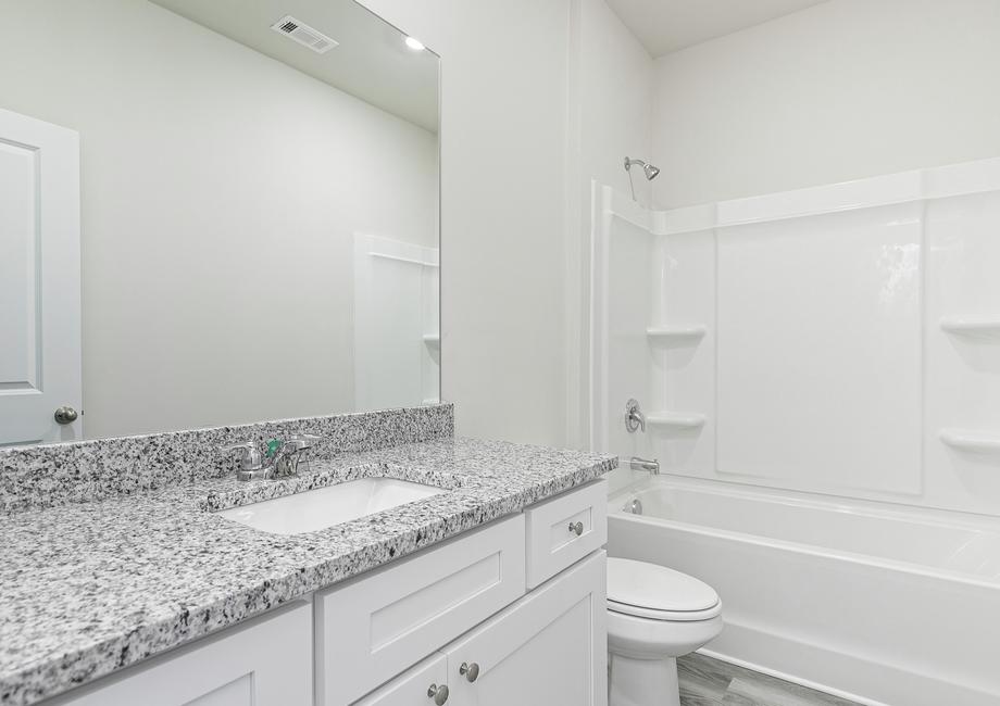 The secondary bathrooms provide your family and guests plenty of space to get ready for their days
