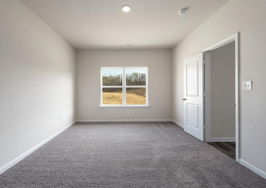 The windows in the master bedroom offer plenty of bright, natural light
