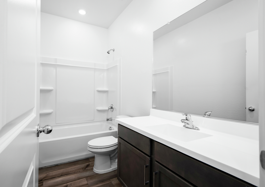 The guest bathrooms are the perfect space for guests to get ready.