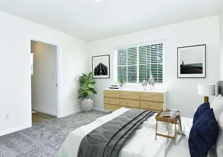 The Adams master bedroom has room for a large bed and bed side tables.